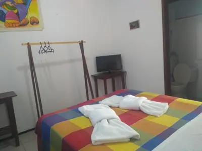 Uma cama ou camas num quarto em EDEN Pousada