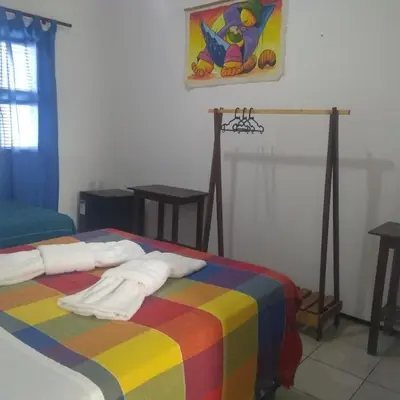Uma cama ou camas num quarto em EDEN Pousada