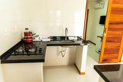 A cozinha ou kitchenette de Flat confortável na Praia Pontal de Maceio CE