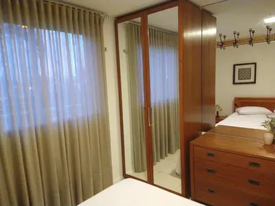 Uma cama ou camas num quarto em Porto das Dunas a 300m do Beach Park Paraíso