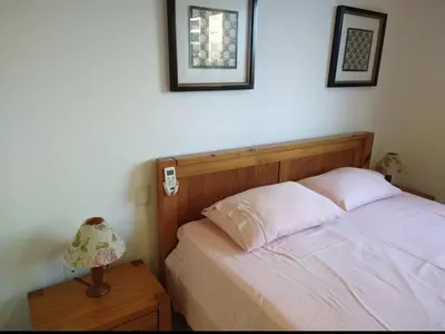 Uma cama ou camas num quarto em Porto das Dunas a 300m do Beach Park Paraíso