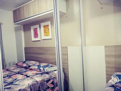 Uma cama ou camas num quarto em Temporada VGFUN CONFORT UNICO