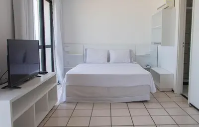 Uma cama ou camas num quarto em Classic Residence Ap 902