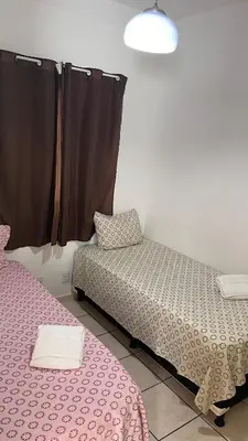 Uma cama ou camas num quarto em Cantinho dos Rehm