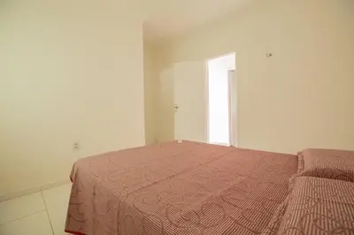 Uma cama ou camas num quarto em Porto das Dunas Casa Temporada Estilo e Conforto 2