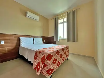 Uma cama ou camas num quarto em BELÍSSIMO 2 SUÍTES- PRÓXIMO DA PRAIA I SAN GIACOMO