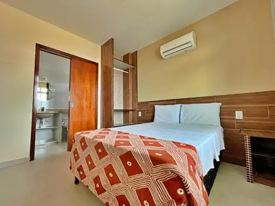 Uma cama ou camas num quarto em BELÍSSIMO 2 SUÍTES- PRÓXIMO DA PRAIA I SAN GIACOMO