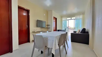 Uma televisão e/ou sistema de entretenimento em BELÍSSIMO 2 SUÍTES- PRÓXIMO DA PRAIA I SAN GIACOMO