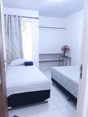 Uma cama ou camas num quarto em Cantinho arretado da Peste - Apartamento