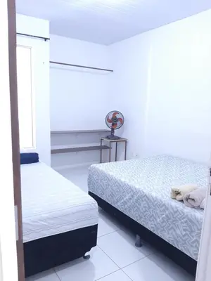 Uma cama ou camas num quarto em Cantinho arretado da Peste - Apartamento