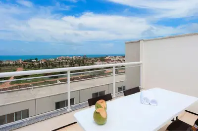 Uma varanda ou terraço em Beach Townhouses #C2 - Apartamento por Carpediem