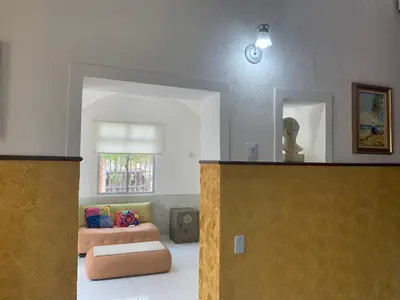 Uma cama ou camas num quarto em Casa do Sol Fortaleza