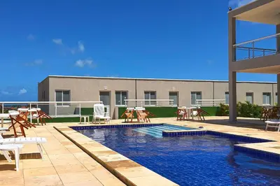 A piscina em ou perto de Beach Townhouses #106 - Conforto por Carpediem