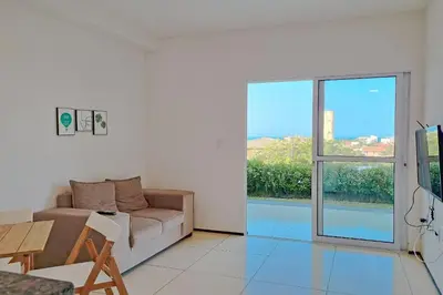 Uma televisão e/ou sistema de entretenimento em Beach Townhouses #106 - Conforto por Carpediem