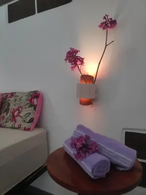 Uma cama ou camas num quarto em Anacardium