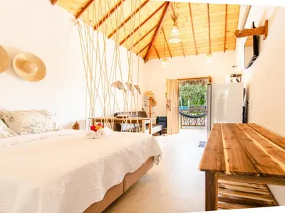 Uma cama ou camas num quarto em Chalés Caminho dos Ventos em Barrinha de Baixo, CE, 9km do Preá