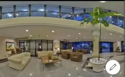Uma área de estar em Lindo Flat no MEIRELES LCFLATS1102