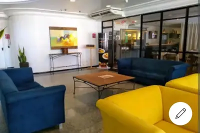 Uma área de estar em Lindo Flat no MEIRELES LCFLATS1102
