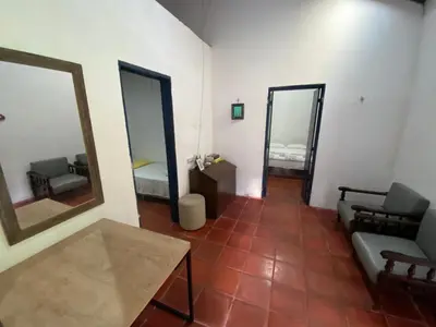 Uma cama ou camas num quarto em Solar dos Pássaros