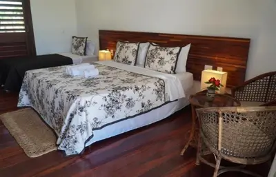 Uma cama ou camas num quarto em Hotel Vila Marola