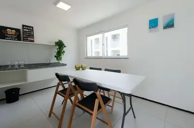 A cozinha ou kitchenette de Beach Townhouses #C10 - Conforto por Carpediem