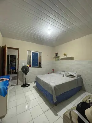 Uma cama ou camas num quarto em Kitnet mobiliado, confortável e bem localizado.