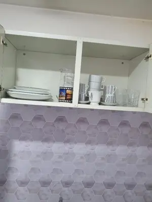 A cozinha ou kitchenette de Praia Mansa Suíte Hotel