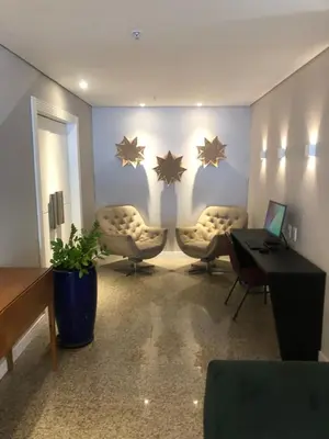 Uma área de estar em Top Flat Fortaleza