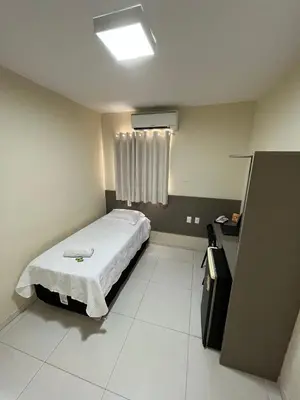 Uma cama ou camas num quarto em SD Plaza Hotel