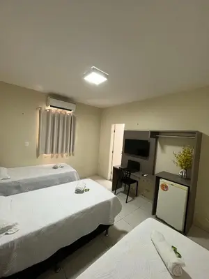 Uma cama ou camas num quarto em SD Plaza Hotel