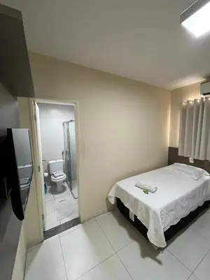 Uma cama ou camas num quarto em SD Plaza Hotel