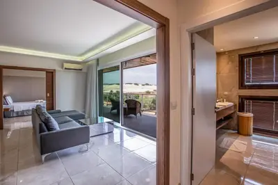 Uma cama ou camas num quarto em VM Hotel Cumbuco