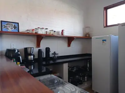 A cozinha ou kitchenette de Casa dos Ximenes - Beira Mar da Taíba - Ótima localização