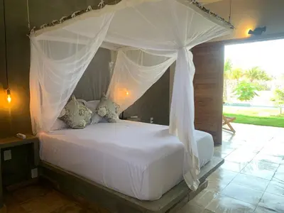 Uma cama ou camas num quarto em Vila Kavaju Preá