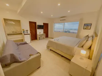 Uma cama ou camas num quarto em Villa Paririö