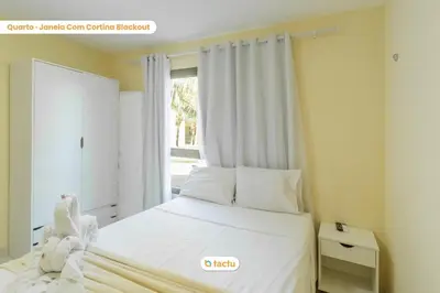 Uma cama ou camas num quarto em Térreo completo e gigante VG Sun Cumbuco por Tactu