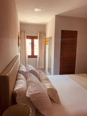Uma cama ou camas num quarto em Beach Eco Stays Hotel Boutique Lagoinha