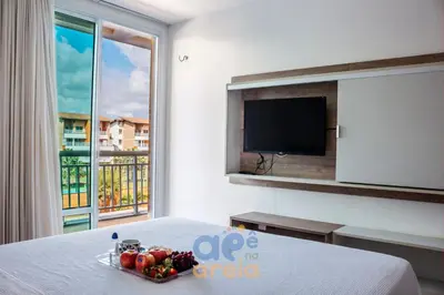 Uma televisão e/ou sistema de entretenimento em Apê na Areia 3Qtos para Famílias Grandes! Pertinho do Beach Park, acesso direto para a praia e Lazer Completo