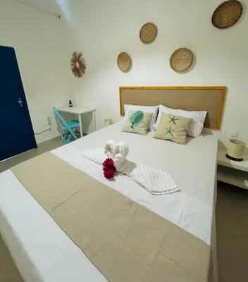 Uma cama ou camas num quarto em Casa boa vida