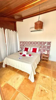 Uma cama ou camas num quarto em Casa boa vida