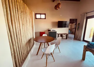 Uma televisão e/ou sistema de entretenimento em Loft Canoa