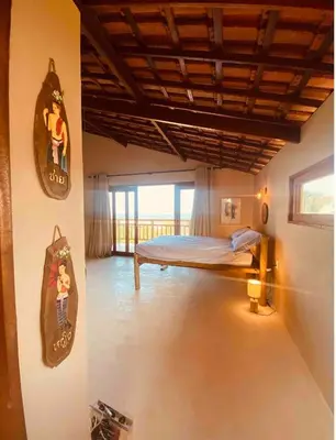 Uma cama ou camas num quarto em Loft Canoa