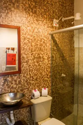 Uma casa de banho em Villa Chic Pousada