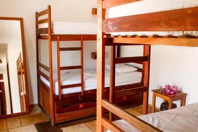 Uma cama ou camas num quarto em Villa Chic Pousada