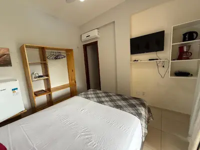 Uma cama ou camas num quarto em Hosts BR - La Serena Suíte Cumbuco