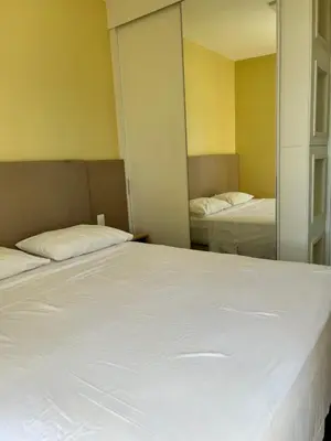 Uma cama ou camas num quarto em Flat avenida abolição 2323 apto 1404