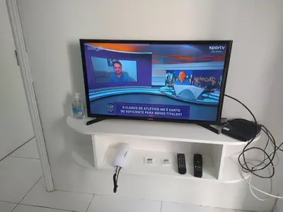 Uma televisão e/ou sistema de entretenimento em Vila Costeira Beira Mar 104 Praia do Meireles