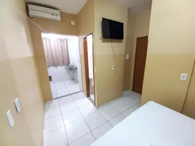 Uma cama ou camas num quarto em Iracema Praia Flats