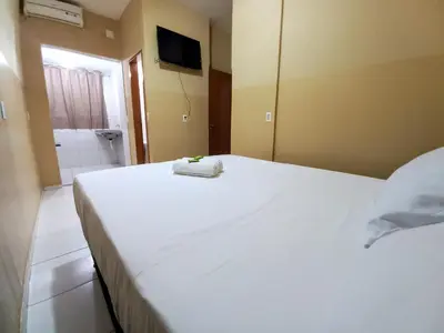 Uma cama ou camas num quarto em Iracema Praia Flats