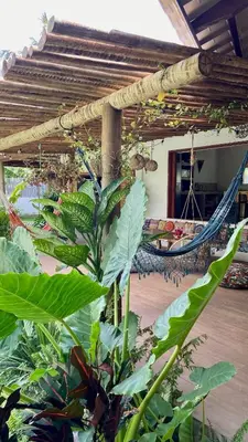 Um jardim no exterior de Casa Boa onda - Icaraizinho